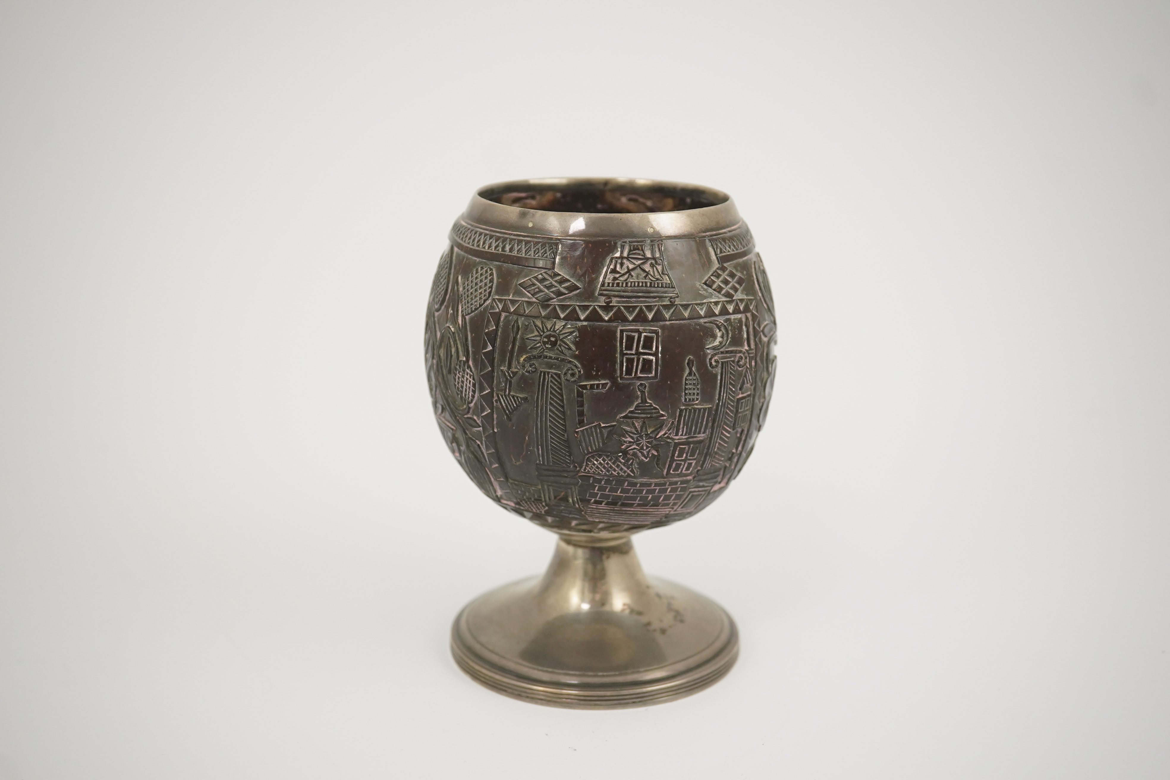 A George III silver mounted 'Masonic' coconut cup, maker GW